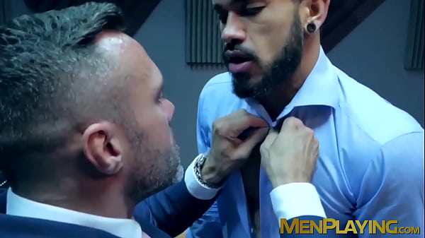 Elegant hunk wears slick blue suit while ramming hot stud